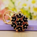 Exquisite black and gold floral sphere keychain with elegant lobster clasp for bags - Black