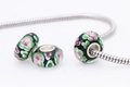 Black glass beads with pink flower patterns on a silver snake chain bracelet - Black with Pink Flowers (Black)