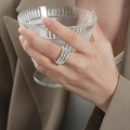 Anillo de eternidad plateado de tres filas con circonitas brillantes para parejas - US 7 / Plata-Circón Blanco