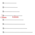 Detailed view of silver stainless steel ball pins with 1.9mm head and 0.6mm wire diameter - 0.6x16mm / Steel