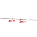 Macro detail of 2mm silver dragon bone chain with 3mm cylindrical metal bead accents - Fine Style / Silver