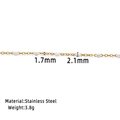 Macro detail of 1.7mm gold stainless steel chain with 2.1mm white enamel beads - 1.7mm / 18K Gold Enamel White Chain