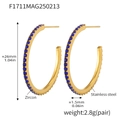 Detailed macro view of 26mm stainless steel hoop earrings with inset blue zircon stones - Style A / 26mm / Gold Blue Zirconia