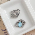 Silver star and moon pendant with a sky blue faceted gemstone and tiny diamonds - Sky Blue Star Moon Streamline Design (28#)