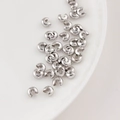 Silver-plated C-shaped crimp bead covers for jewelry making on white tray - 3mm (Approx 0.05g) / Platinum