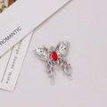 Silver liquid metal butterfly pendant with a red oval gemstone on a white textured backdrop - Silver Liquid Style with Red Rhinestone (12#)