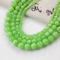 Multiple sizes of smooth green jade round beads for DIY jewelry and necklaces - 4mm (10 Counts) / Greenish Jade (Style 78)