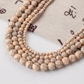Multi-layer necklace with beige turquoise beads featuring natural black marble textures - Turquoise-149