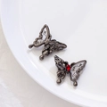 Schmuckperle als Schmetterling in Gunmetal mit rotem Tropfenstein und Kalligrafie - Einzelpreis / Waffenschwarz mit rotem Strass (1#)