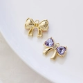 Colgante de lazo dorado con cristal de corazón morado y diamantes blancos - Base Dorada Circonia Violeta