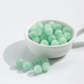 Translucent mint green round cat eye glass beads for DIY jewelry making in white bowl - 10mm / 10 Beads / Gilding Lake Green