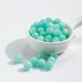 Translucent mint green round beads 8mm for DIY jewelry making in a white ceramic dish - 10mm / 10 Beads / Gilding Lake Blue