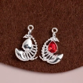 Silver alloy whale bone pendant with red water-drop crystal and crescent hollow design - Silver Base Red Zirconia