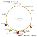 Detail view of stainless steel fruit charm necklace with zircon accents and enamel oil drip - Necklace / Gold / 41+5cm
