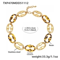 Detail of vintage gold stainless steel chain necklace with leopard resin links and clasp - Necklace / Gold