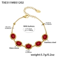 Dettaglio del bracciale in acciaio inossidabile placcato oro 18k con pietre rosse ovali - Bracciale d'oro con zircone rosso (TXE511)