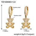 Detail of bear hoop earrings in stainless steel with pavé zircons and a heart stone - Gold Earrings (TXF500)