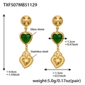 Detailed view of heart-shaped earrings with green glass stone and dimensions in inches - Green Heart Earrings (TXF507)