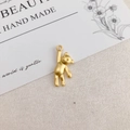 Golden matte alloy bear charm for DIY jewelry making featuring a hanging pose design - Matte Gold Bear