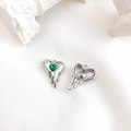 Alloy melting heart pendant featuring a green zirconia stone with fluid metal drip detail - Silver with Green Rhinestone