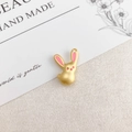 Golden bunny charm with pink enamel detail and a round hanging hole for DIY jewelry - Pink Matte Gold Rabbit