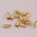 Terminali cilindrici placcati in oro con connettori ad anello per creazione gioielli - Diametro interno 1mm / 18K
