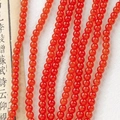 Translucent orange-red 8mm glass beads strands with a glossy finish for jewelry making - Orange Red