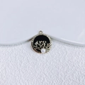 Detailed view of a gold coral heart pendant with imitation pearl and rhinestones - Gold Round Coral Black Base (2)