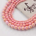 Pink natural stone beads with gold foil effect arranged in a layered curve pattern - 4mm (10 Pcs) / Pink Gold Style