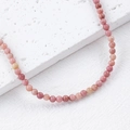Pink and purple natural stone beads necklace accessory in a minimalist jewelry display - 1 Piece / Red Wood Vein 4mm