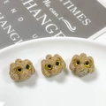 Macro shot of three iridescent resin teddy dog charms for DIY jewelry making - Iridescent Light Brown (6#)