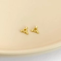Macro shot of gold-plated irregular alloy spacer beads for DIY jewelry making - Small / Gold
