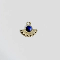 Macro detail of fan-shaped gold stainless steel pendant with blue lapis lazuli stone - Lapis Lazuli