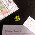 Close-up of gold alloy monster charm with green cat eye stone for DIY jewelry - Light Green Eye Gold Base