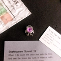Detailed view of monster eye charm with purple iris and silver metal frame for DIY jewelry - Dark Pink Eye Silver Base