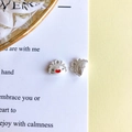 Macro shot of silver dragon-egg charms with Fu character and cartoon smiley face - Matte Silver Dumpling (3#Matte Silver Dumpling)