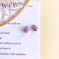Detailed view of silver-tone dragon and tiger charms with pink enamel and coin motif - White K (5#White K)