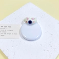 Schattige monsterring in crèmewit met paars oog en roze hoorns ontwerp - Off-white Paars Oog Roze Hoorn (29#)