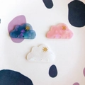 Close-up of marble pattern acrylic cloud hair accessories with golden sun design - Mixed Cloud