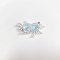 Close-up of liquid metal silver double heart pendant with iridescent crystals and rhinestones - Light Blue Matte Silver Heart