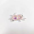 Detail of pink crystal double heart pendant with silver fluid metal frame and accent diamonds - Pinkish Matte Silver Heart