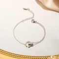 Bracelet argenté à doubles anneaux avec chiffres romains et pierres en zircone - Bracelet / Acier