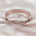 Polished rose gold wave bangle with inlaid crystals on elegant pink silk background - Rose Gold (Z117C)