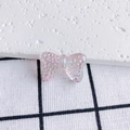 Macro detail of a translucent iridescent pink resin butterfly charm with glitter finish - Iridescent Pink Glitter (3#)