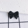 Dettaglio di fiocco in acrilico nero con strass scintillanti per accessori gioielli fai-da-te - Nero Classico