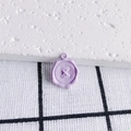 Macro shot of light purple enamel candy-colored button-shaped charm for DIY jewelry making - Purple Button Wax Seal Style (2#)