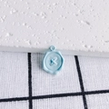 Close-up of light blue candy-colored button pendant charm for DIY jewelry making - Blue Button Wax Seal Style (4#)