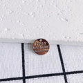 Detailed close-up of a round silver alloy pendant with engraved Italy Mac Mode text - ITALY Engraved Round Charm (7#)