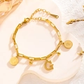 Gold paperclip chain bracelet featuring Elizabeth II coins, letter G and bead charms - Queen Portrait - Letter G (7840)