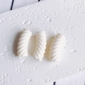 Detailed view of three white resin spiral twist tube beads for DIY bracelet jewelry making - White (3#)